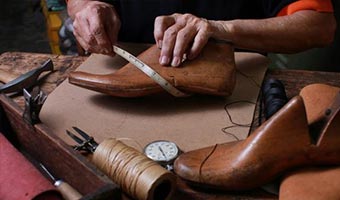 repairing brown leather shoes